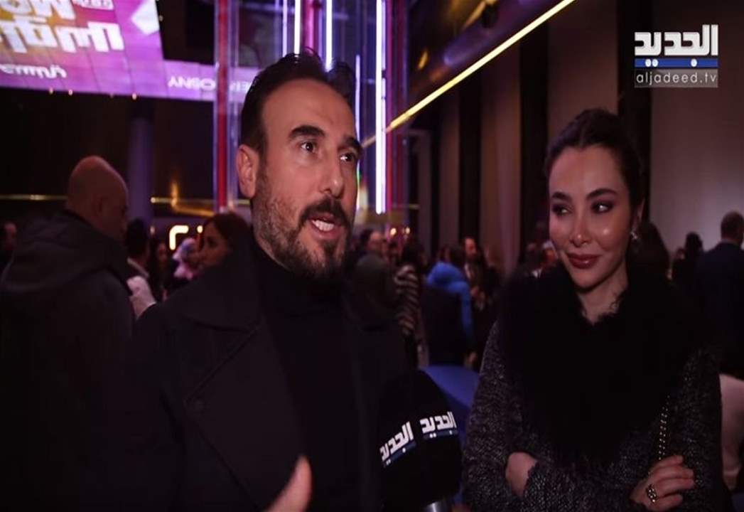 زوجة باسم مغنية تعلق على القبلة الحميمة بأعماله والأخير يلجأ إلى السياسة في "ليالي الشمال" -بالفيديو