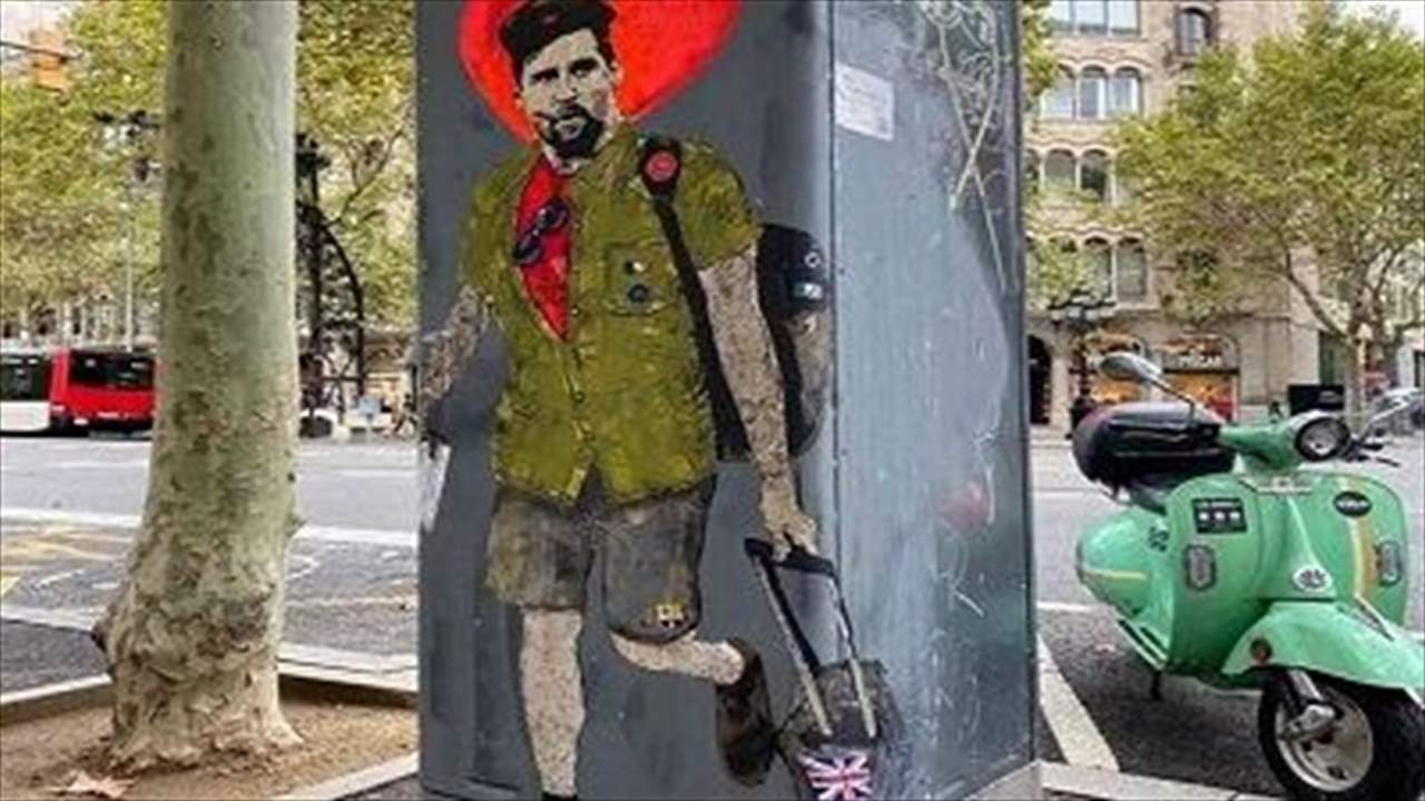 لوحة رائعة لـ "تشي ميسي غيفارا" على جدار في برشلونة