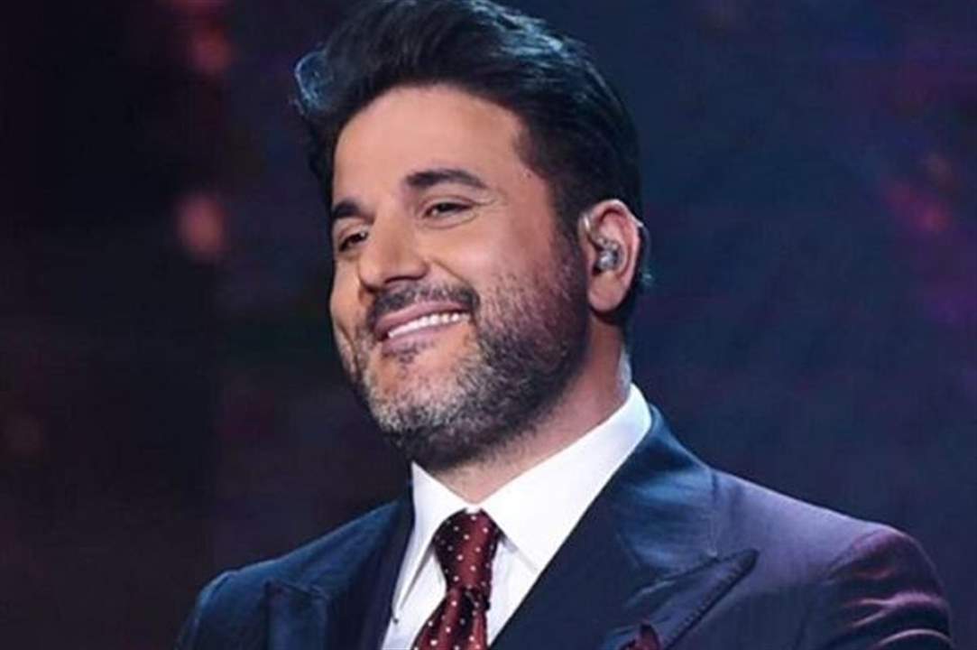 ابن ملحم زين بظهور نادر وشبه واضح بينه وبين والده -بالصورة