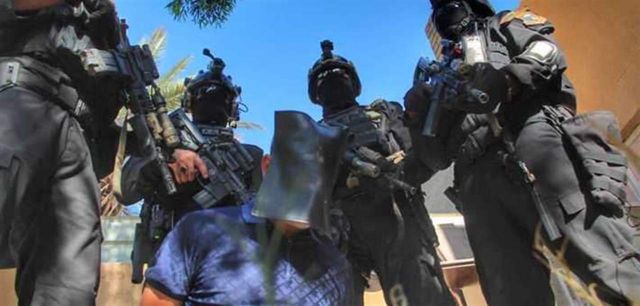 بالصور- اعتقال "أبو نبأ" الداعشي بعملية أمنية سرية في مطار بغداد