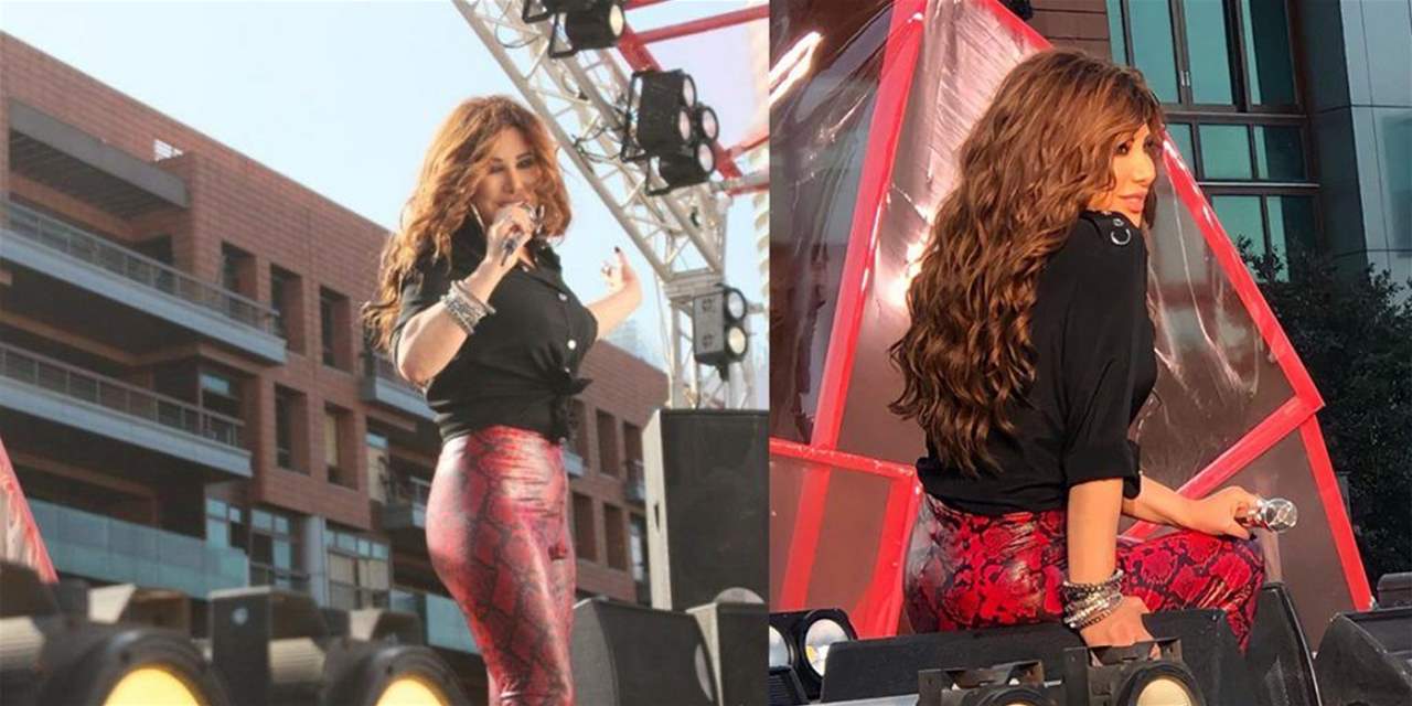 نجوى كرم تقف على الجناح المقابل للدمار لإعادة الحياة الى بيروت "لبنان لا يموت"