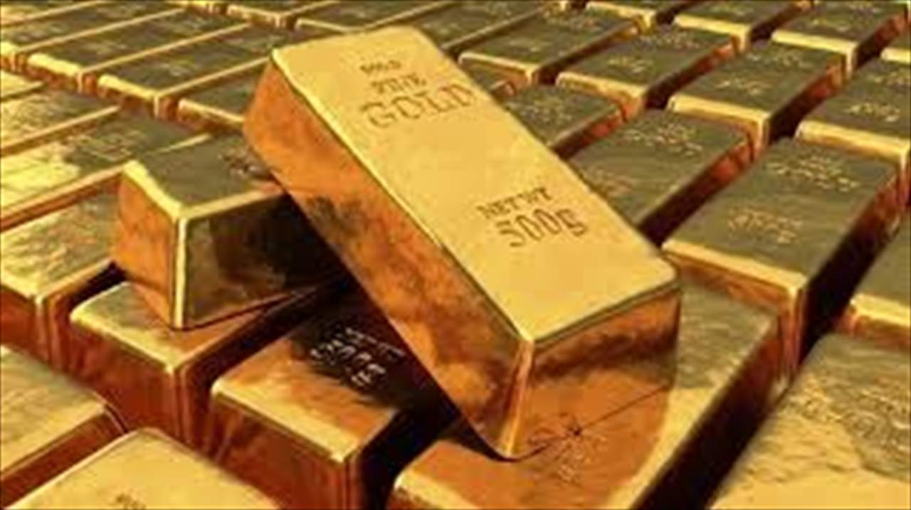الذهب يهبط مع صعود الدولار لأعلى مستوى في أسبوعين