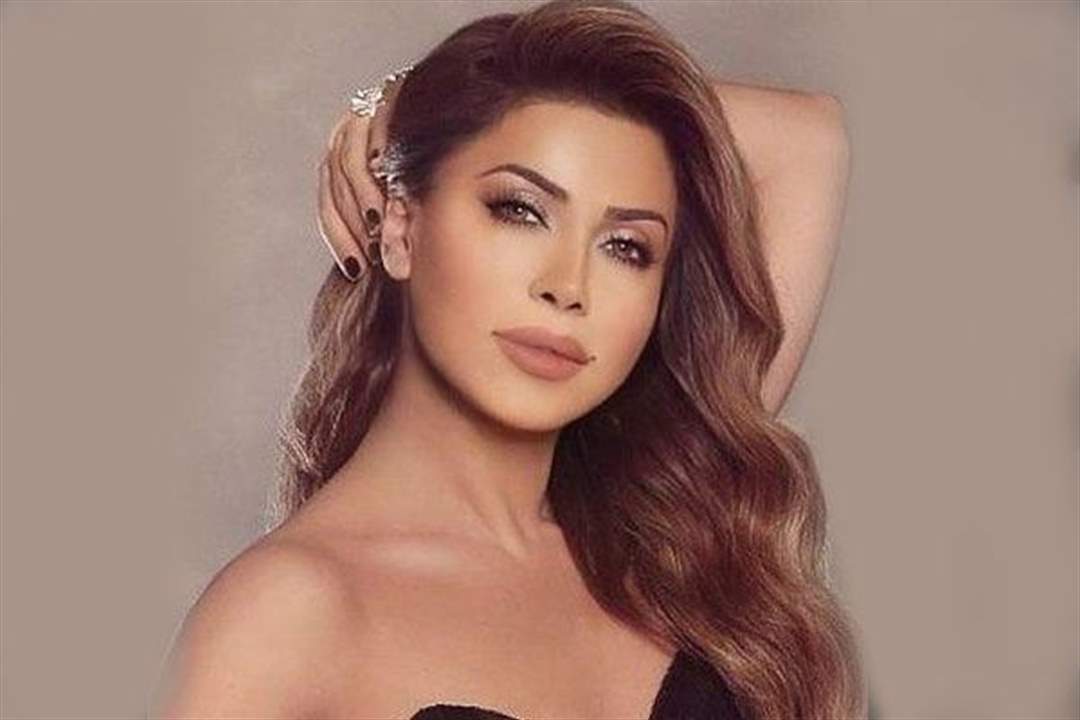 نوال الزغبي بأقوى رد على متابعة سخرت من صورها 
