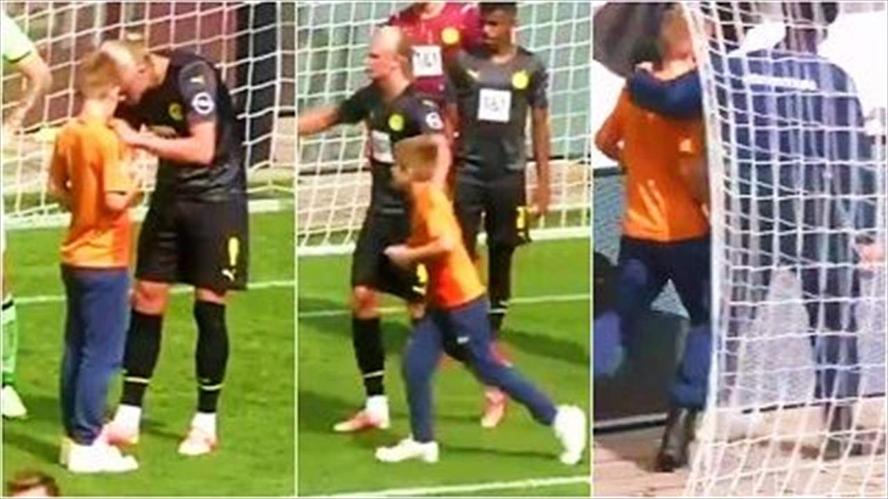 بالفيديو - ولد يدخل الملعب خلسة ويصل إلى هالاند