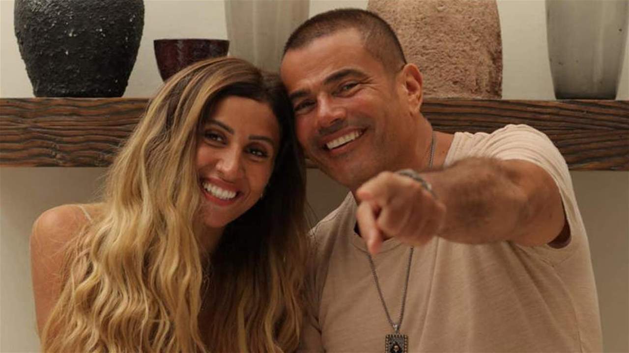 عمرو دياب بين أحضان فتاة لبنانية جميلة والجمهور يعتبره استفزازًا لـ دينا الشربيني !