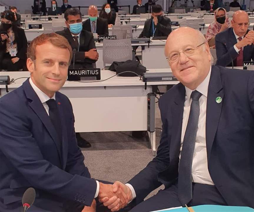 دردشة بين الرئيس الفرنسي ايمانويل ماكرون ورئيس مجلس الوزراء نجيب ميقاتي