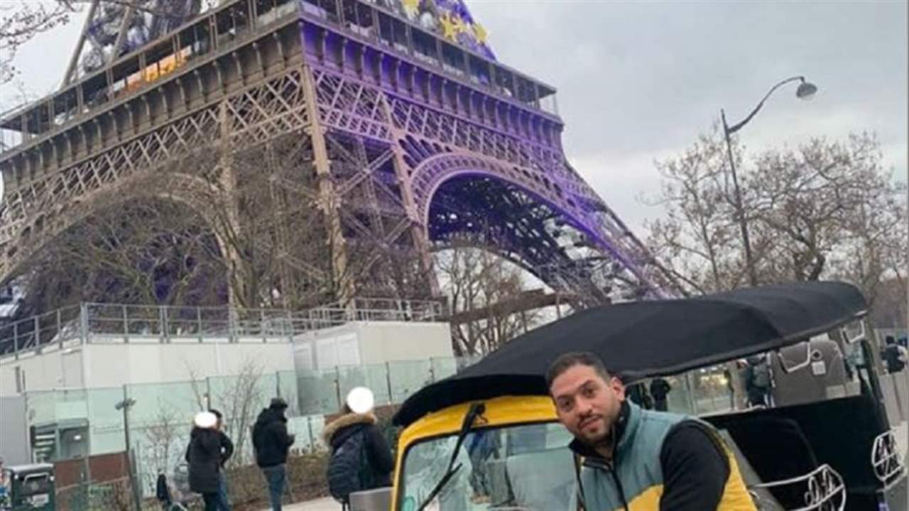  قصة صورة "التوك توك" المصري أمام برج إيفل في باريس 