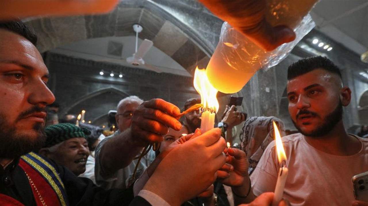     للمرة الأولى.. شعلة "النار المقدسة" تصل من القدس المحتلة إلى العراق