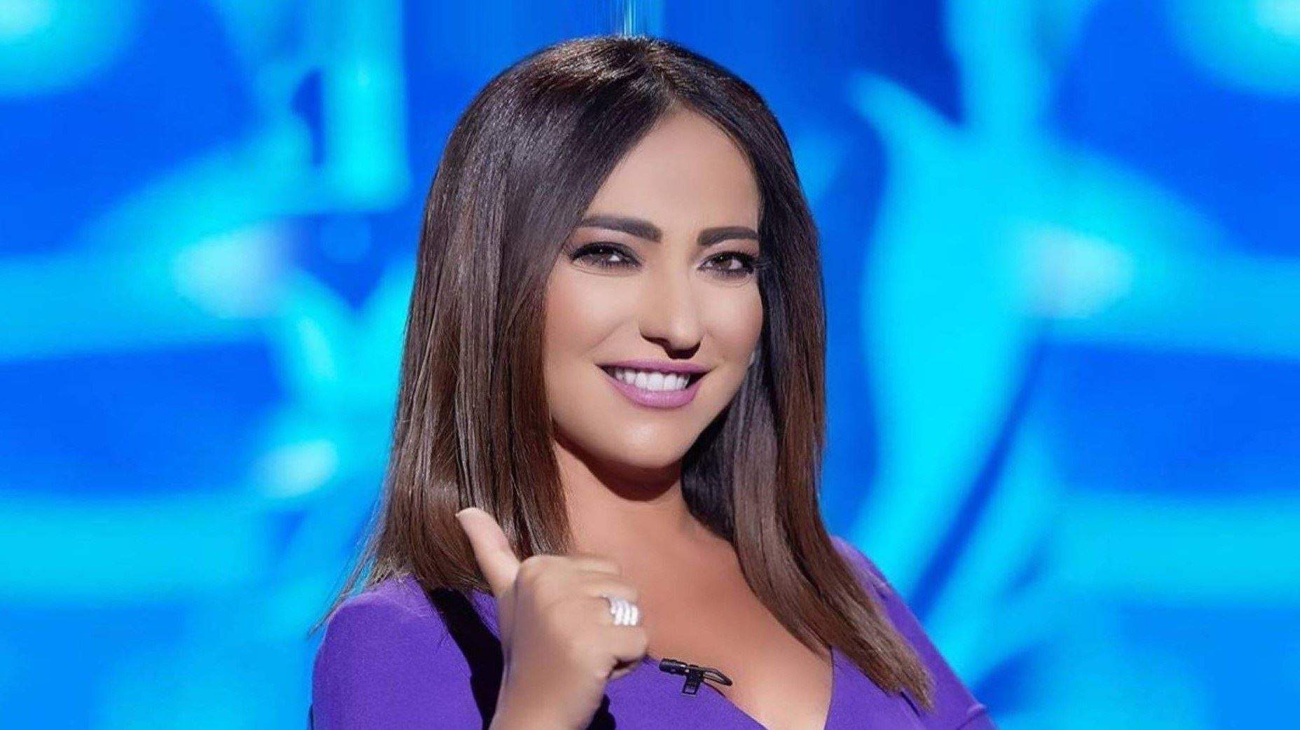 أمل عرفة توضح حقيقة دخول ابنتها الوسط الفني