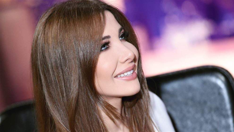 فيديو عفوي لـ نانسي عجرم تسقط خلال تصوير كليب اغنيتها الجديدة