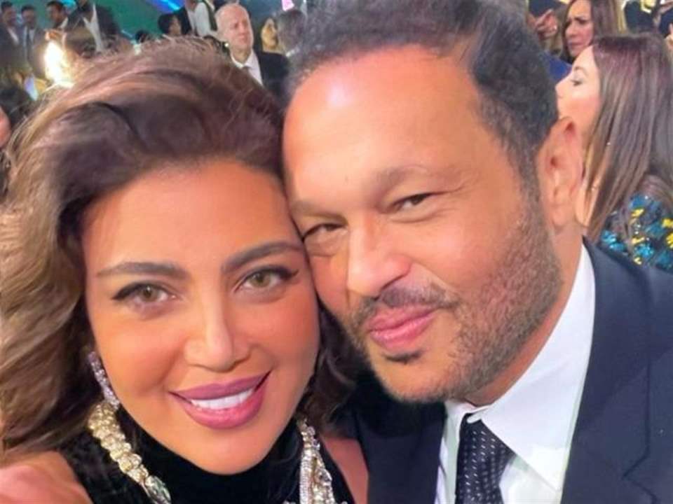 لحظات رومانسية بين ريهام حجاج وزوجها