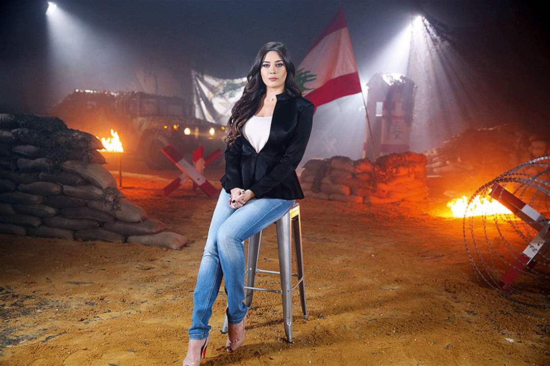 ناشطة تنتقد ابتسامة محمد رعد في دفن ابنه ونادين ويلسون نجيم تواجهها: ما بتعرفي شي عن غصة الأب