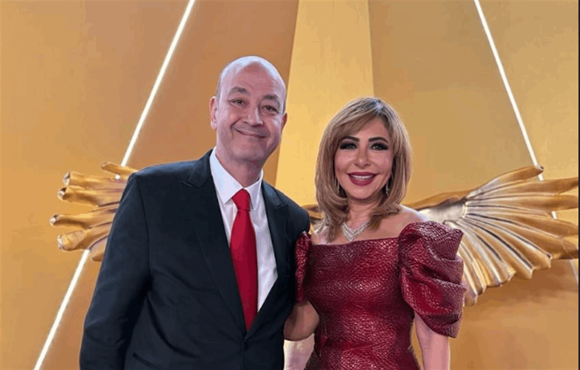 عمرو اديب ولميس الحديدي يتجاهلان الانفصال 