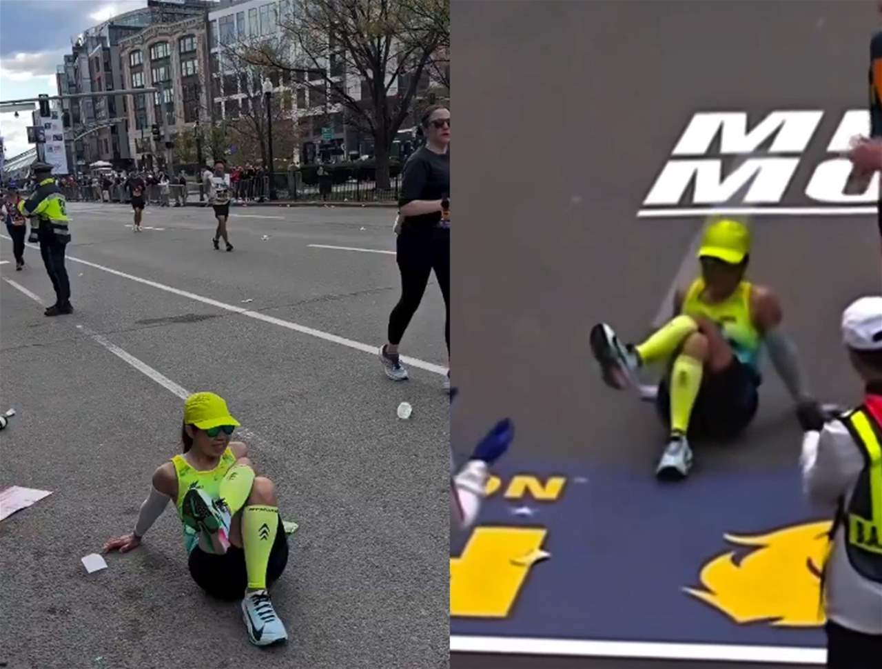 فيديو - إصرار يتحدّى الألم.. عداءة تزحف الى خط النهاية 