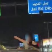 حركات "بهلوانية" من نافذة السيارة (فيديو)