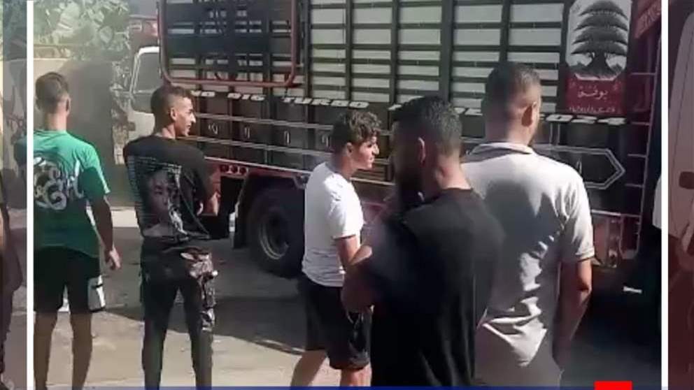 تسليم السلاح الثقيل في مخيم الرشيدية