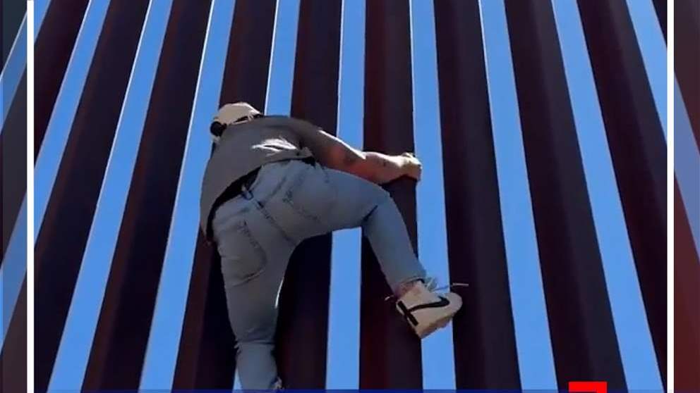 ردًا على قرار ترامب.. مؤثر يتسلق جدار المكسيك