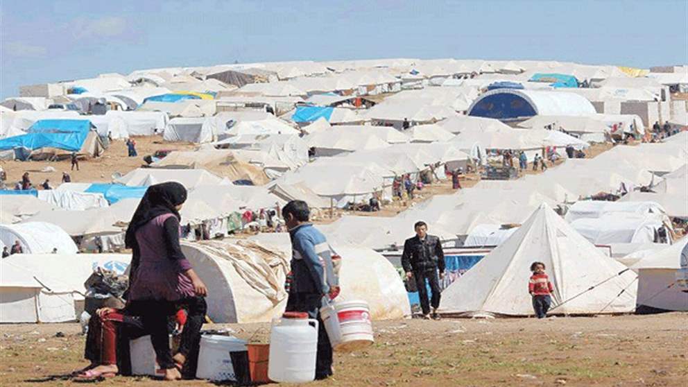 تفكيك مخيم للنازحين السوريين (شاهد الفيديو)