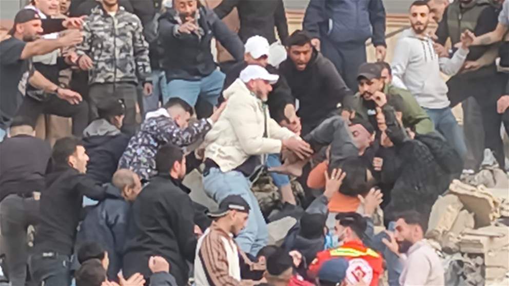 إنقاذ طفل من المبنى المنهار في التبانة - طرابلس (فديو)